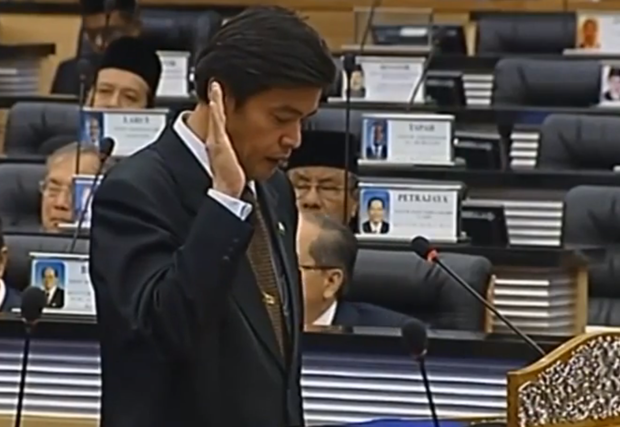 Videograb shows Seah Leong Peng being sworn in as MP for Teluk Intan. u00e2u20acu201d courtesy YouTube.com