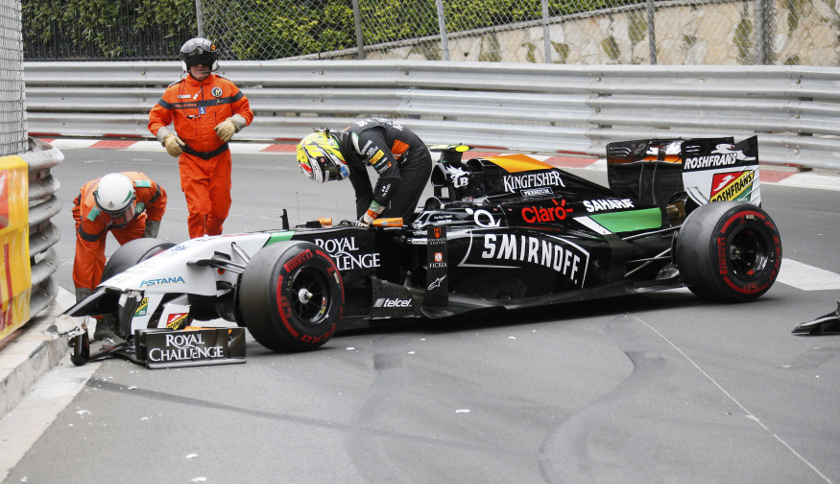 Force India Formula One driver Sergio Perez leaves his car after crashing at the start of the Monaco F1 Grand Prix in Monaco, May 25, 2014. u00e2u20acu201d Reuters pic