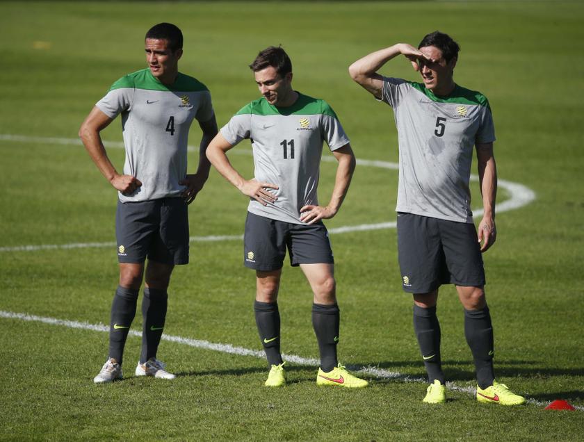 Australian national soccer team Socceroos players (from left) Tim Cahill, Tommy Oar and Mark Millgan look on during a training session in Sydney May 23, 2014. u00e2u20acu201d Reuters pic