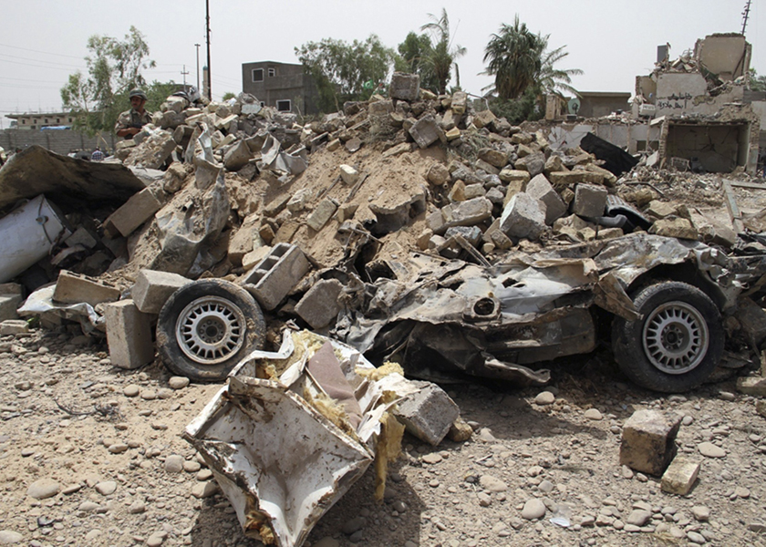 A destroyed vehicle is seen at the site of a car bomb attack in the town of Jalawla, June 8, 2014. u00e2u20acu201d Reuters pic