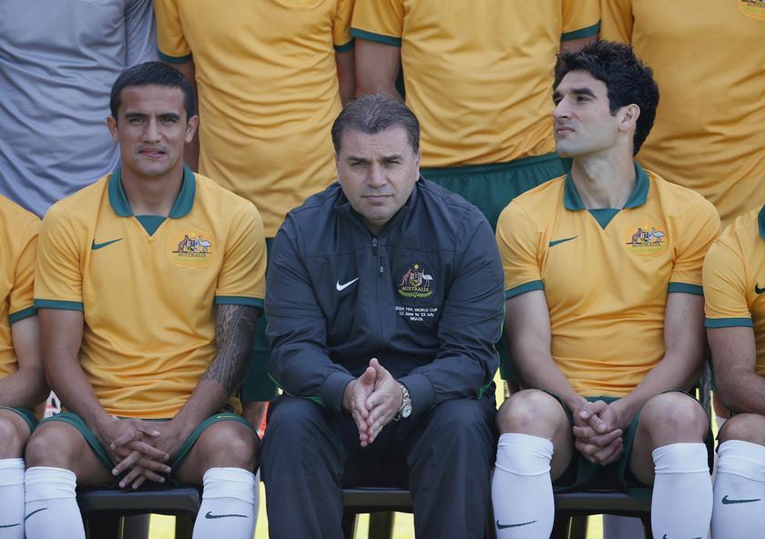 Australian national football team Footballoos coach Ange Postecoglou (centre) poses for a photo alongside team captain Mile Jedinak (right) and vice captain Tim Cahill (left) before a training session in Sydney, May 23, 2014. u00e2u20acu201d Reuters pic