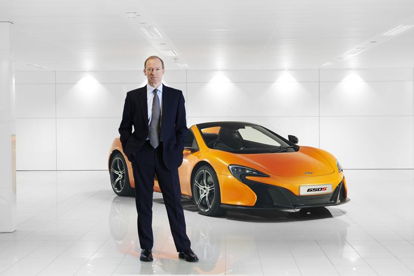 McLaren Automotive CEO Mike Flewitt poses in front of the 650S, the new supercar presented earlier this year. u00e2u20acu201d AFP pic
