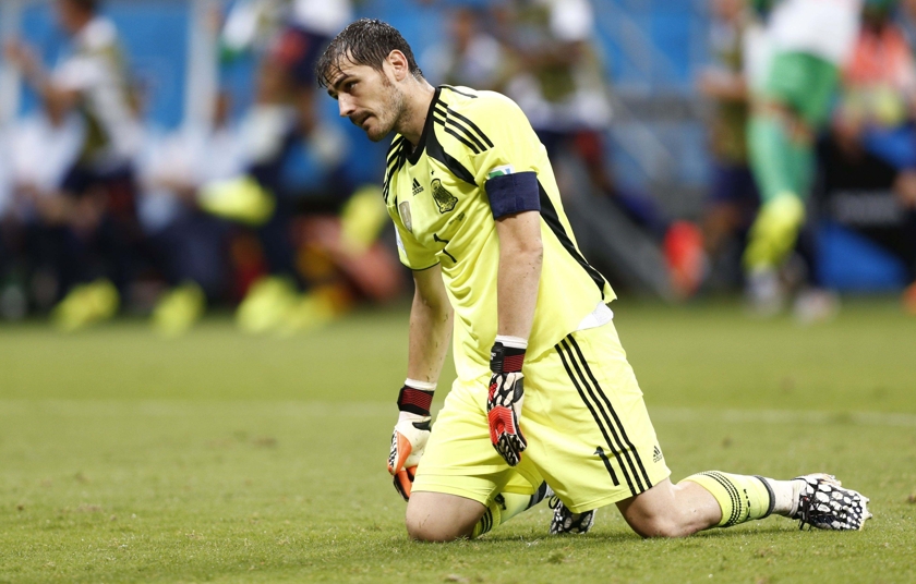Spain's goalkeeper Iker Casillas reacts after a goal by Netherlands during their 2014 World Cup Group B soccer match at the Fonte Nova arena in Salvador June 13,2014. u00e2u20acu201d Reuters pic