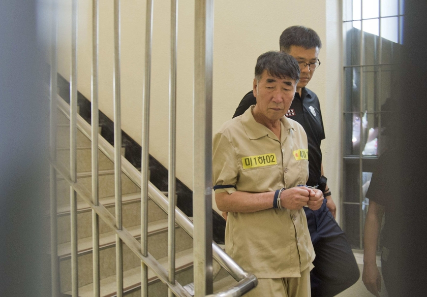 Lee Joon-seok, captain of sunken ferry Sewol, arrives at a court in Gwangju June 10, 2014. u00e2u20acu201d Reuters pic