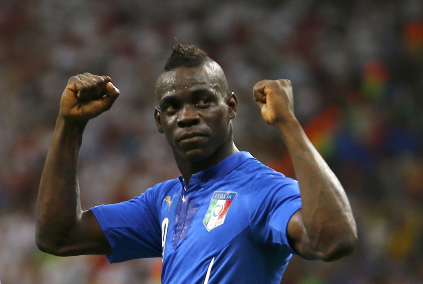 Italy's Mario Balotelli celebrates after scoring a goal past England's goalkeeper Joe Hart during their 2014 World Cup Group D football match at the Amazonia arena in Manaus June 14, 2014.u00e2u20acu201d Reuters pic