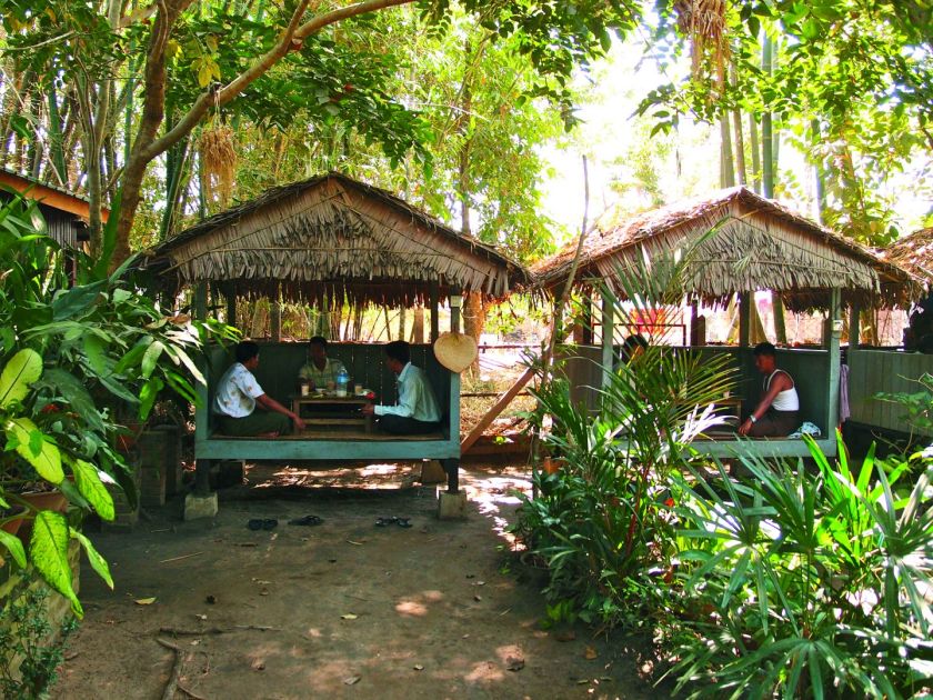 Fellow customers at a toddy restaurant in Thanlyin. — Picture by Alex Toh/Today