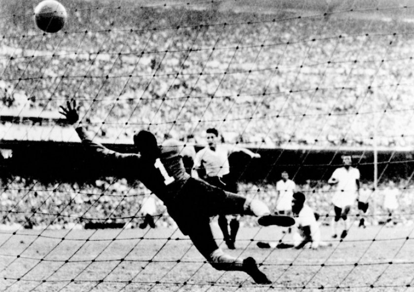 File picture taken 16 July 1950 at the Maracana stadium in Rio de Janeiro, when Uruguayan Juan Alberto Schiaffino (centre) scores the first goal of his team against Brazil, during the 1950 FIFA World Cup final. — AFP PIC