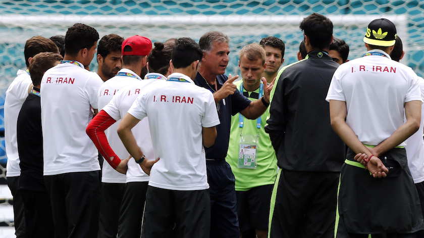 Iranu00e2u20acu2122s coach Carlos Queiroz (centre) gestures as he speaks to his players during a visit at the Arena Fonte Nova stadium ahead of their 2014 World Cup clash against Bosnia and Herzegovina in Salvador, June 24, 2014. u00e2u20acu201d Reuters pic