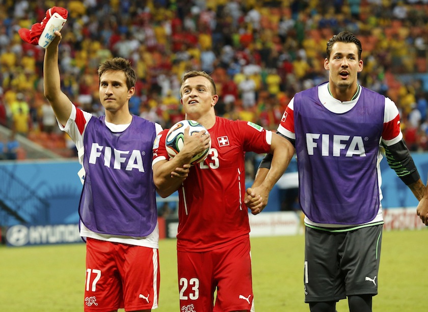 (From left) Switzerland's Mario Gavranovic, Xherdan Shaqiri and Buerki celebrate their victory over Honduras during their 2014 World Cup Group E match at the Amazonia arena in Manaus June 26, 2014.u00c2u00a0u00e2u20acu201d Reuters pic