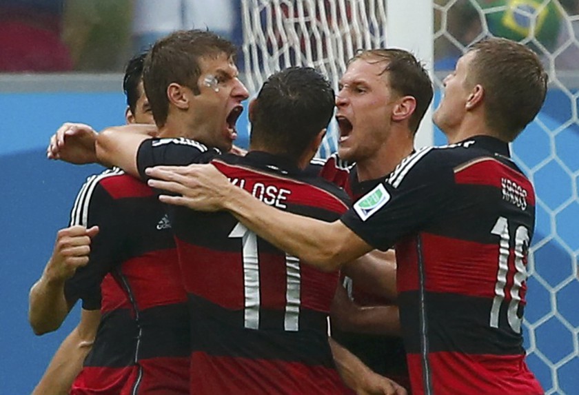 Germanyu00e2u20acu2122s Thomas Mueller (left) celebrates his goal against the US with his teammates during their World Cup Group G match at the Pernambuco arena in Recife June 26, 2014. u00e2u20acu201d Reuters pic