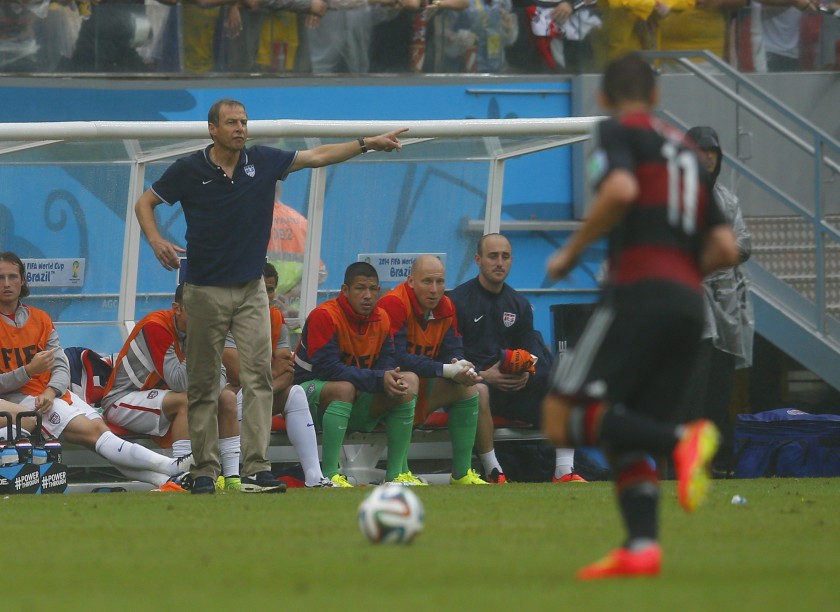 US coach Juergen Klinsmann (left) gives instructions to his players during their World Cup Group G match against Germany at the Pernambuco arena in Recife June 26, 2014. u00e2u20acu201d Reuters pic