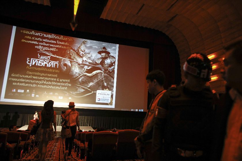People in Bangkok June 14, 2014, attend a reconciliation screening of u00e2u20acu02dcThe Legend of King Naresuanu00e2u20acu2122 organised by the military Reuters