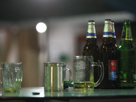 Empty beer bottles left discarded at a food centre in Ang Mo Kio. Photo by Don Wong, 05 Jan 2014. . u00e2u20acu201d TODAY pic