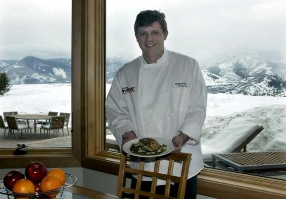 Chef Ben Ford poses with a crusted halibut entree he prepared at the Anderson inHome house, January 19, 2004, in Park City, Utah during the Sundance Film Festival Reuters
