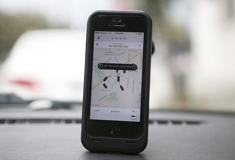 An Uber app seen on an iPhone in Beverly Hills, California, December 19, 2013 Reuters