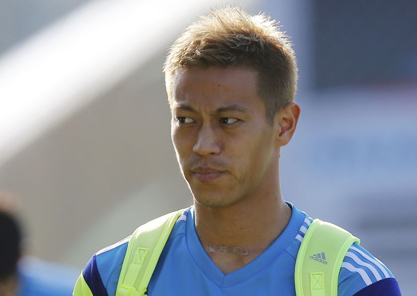 Japan's national football team player Keisuke Honda arrives at the pitch before a training session at Japan's team base camp in the town of Itu north-west of Sao Paulo June 16, 2014. u00e2u20acu2022 Reuters pic  