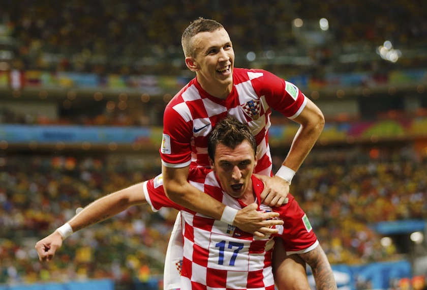 Croatia's Mario Mandzukic (bottom) celebrates after scoring a goal with teammate Ivan Perisic during their 2014 World Cup Group A match against Cameroon at the Amazonia arena in Manaus June 19, 2014.u00c2u00a0u00e2u20acu201d Reuters pic