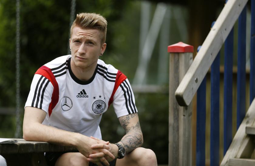 German national soccer player Marco Reus listens during a media day at Hotel Andreus in St. Martin, northern Italy, May 25, 2014. u00e2u20acu201d Reuters pic