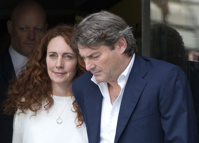 Former News International chief executive Rebekah Brooks and her husband Charlie leave the Old Bailey courthouse in London June 24, 2014. u00e2u20acu201d Reuters pic