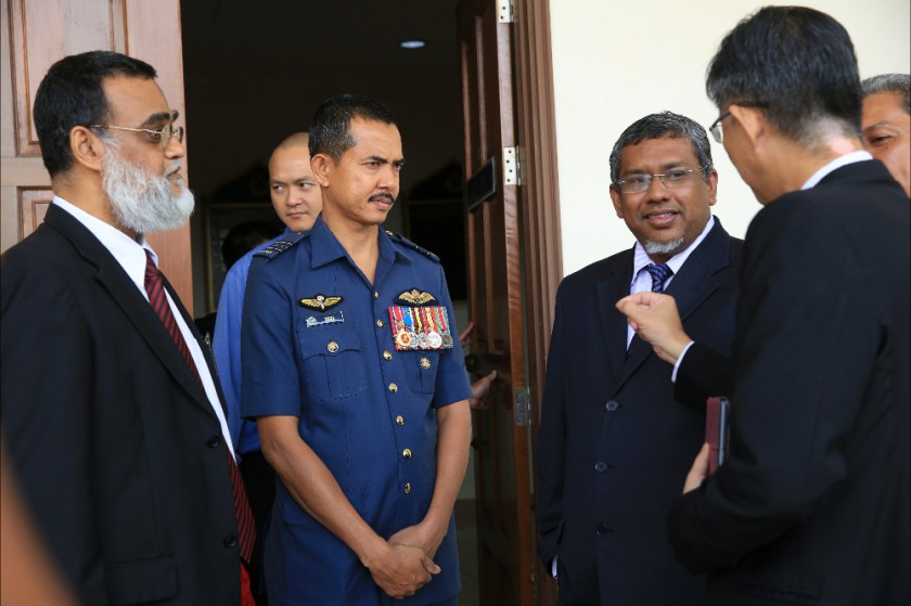 Air Force Major Zaidi (second left) arriving to attend his trial at the Military Court at Pangkalan TUDM Sungai Besi, Kuala Lumpur, June 10, 2014. u00e2u20acu201d Picture by Saw Siow Feng