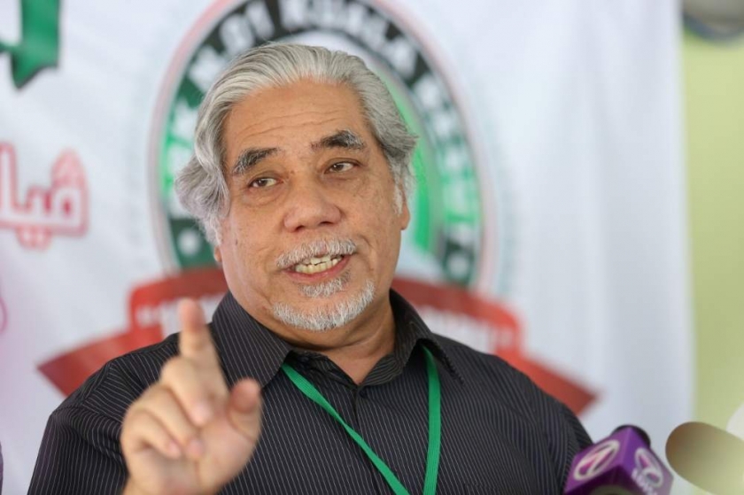 File picture shows PAS secretary-general Datuk Mustafa Ali who said party member Lotfi Ariffin has been sacked. Lotfi had reportedly joined a militant Islamic group in Syria. u00e2u20acu201d Picture by Saw Siow Feng