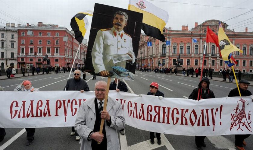 Russian nationalists carry a portrait of Soviet dictator Josef Stalin as they parade in Russiau00e2u20acu2122s second city of St. Petersburg, on May 1, 2014, during May Day celebrations. u00e2u20acu201d AFP pic