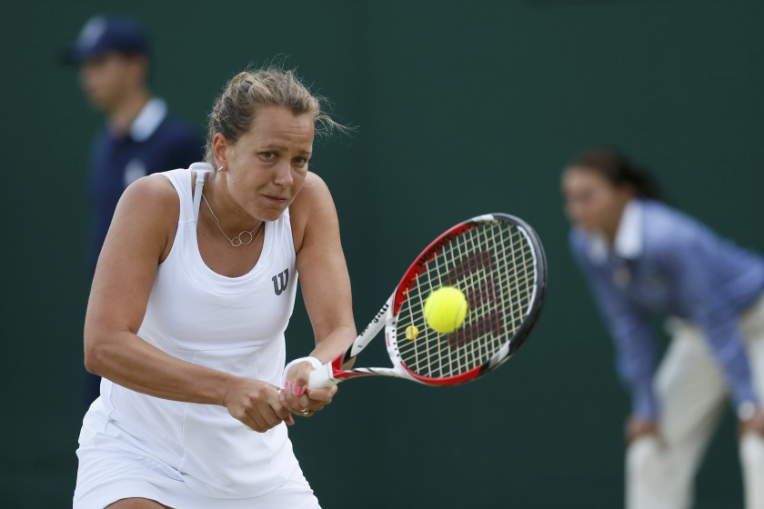 Barbora Zahlavova Strycova hits a return to Caroline Wozniacki during their womenu00e2u20acu2122s singles tennis match at the Wimbledon Tennis Championships, in London June 30, 2014. u00e2u20acu201d Reuters pic