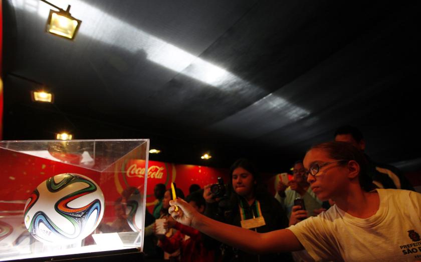 Visitors take photographs of World Cup soccer balls during the World Cup u00e2u20acu02dcTrophy Touru00e2u20acu2122 in Sao Paulo May 29, 2014. u00e2u20acu201d Reuters pic