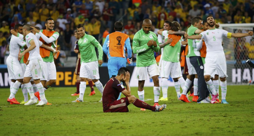 Russiau00e2u20acu2122s Alexander Samedov (centre) reacts at the end of their World Cup Group H match against Algeria at the Baixada arena in Curitiba June 26, 2014. u00e2u20acu201d Reuters pic