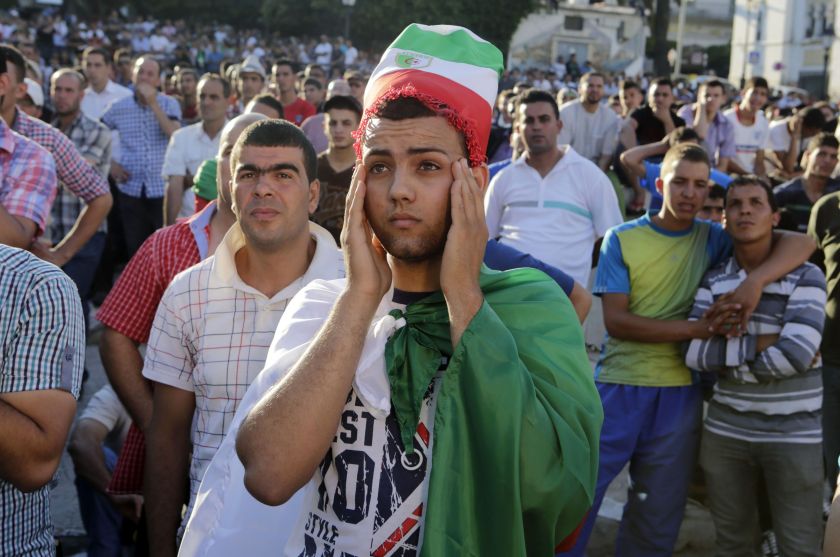 Algerian fans react while watch their team play Belgium during their 2014 World Cup Group H football match at a public screening event in Algiers June 18, 2014. u00e2u20acu201d Reuters pic