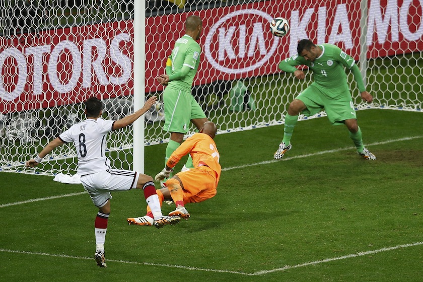 Germany's Mesut Ozil (left) scores against Algeria during their 2014 World Cup round of 16 game at the Beira Rio stadium in Porto Alegre July 1, 2014.u00c2u00a0u00e2u20acu201d Reuters pic