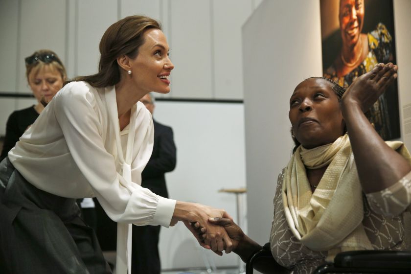 Actress and Special Envoy of the United Nations High Commissioner for Refugees, Angelina Jolie, speaks with Neema Namadamu of the Democratic Republic of Congo at the 'End Sexual Violence in Conflict' summit in London June 11, 2014. u00e2u20acu201du00c2u00a0Reuters pic