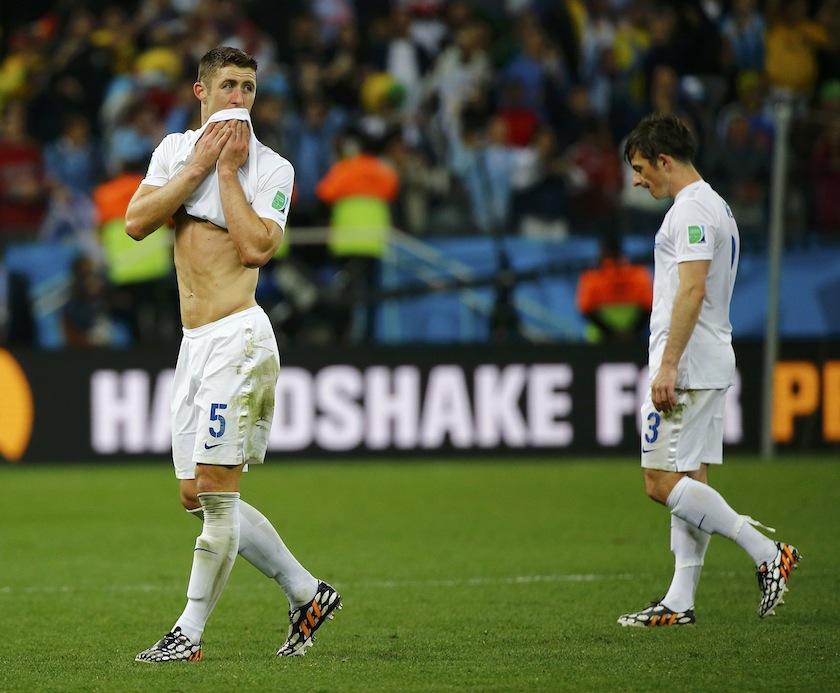 England's Gary Cahill (left) and Leighton Baines show dejection after their 2014 World Cup Group D match against Uruguay at the Corinthians arena in Sao Paulo June 20, 2014.u00c2u00a0u00e2u20acu201du00c2u00a0Reuters pic