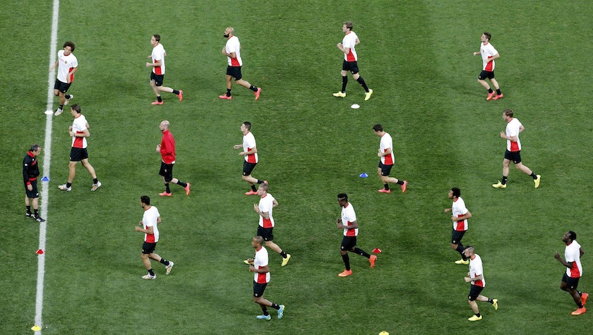 Belgium's national players run during a training session at the Corinthians arena in Sao Paulo, June 25, 2014. u00e2u20acu201d Reuters pic