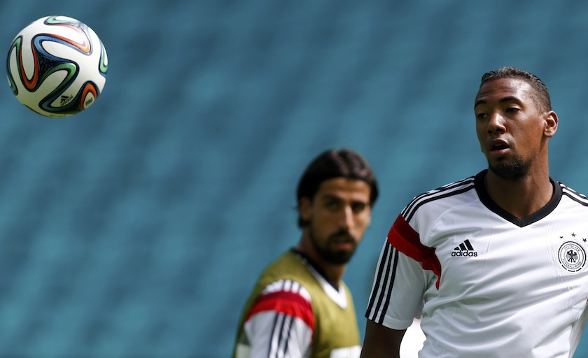 Germany's Jerome Boateng (right) and Sami Khedira watch the ball during a training session at the Arena Fonte Nova stadium ahead of their 2014 World Cup against Portugal in Salvador, June 15, 2014. u00e2u20acu201d Reuters pic
