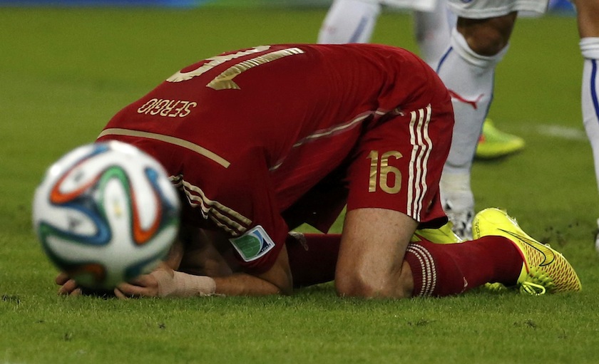 Spain's Sergio Busquets reacts after missing a chance to score a goal during their 2014 World Cup Group B match against Chile at the Maracana stadium in Rio de Janeiro June 19, 2014.u00c2u00a0u00e2u20acu201d Reuters pic