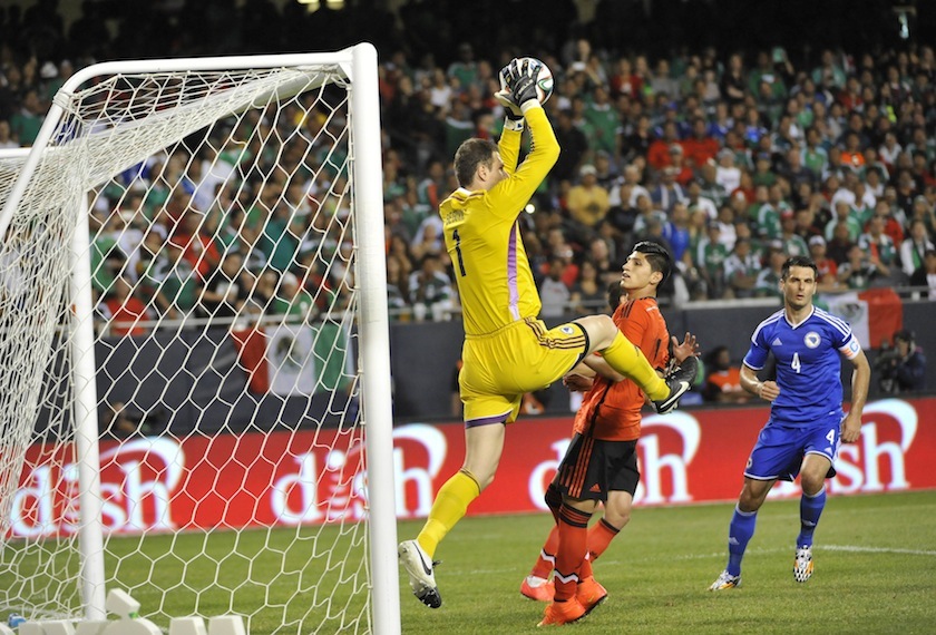 Bosnia and Herzegovina goalkeeper Asmir Begovic makes a save against the Mexico during the second half at Soldier Field. Bosnia and Herzegovina defeated Mexico 1-0. u00e2u20acu201du00c2u00a0Reuters pic