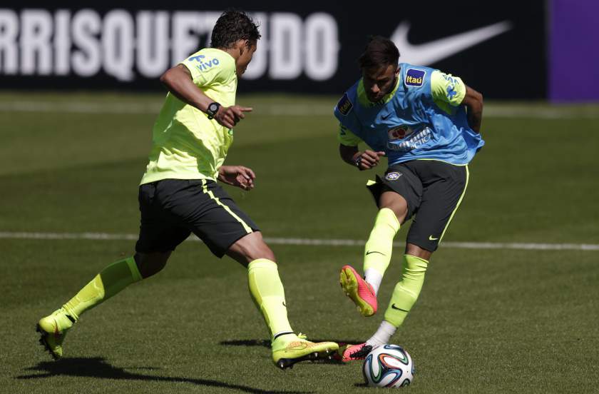 Brazilu00e2u20acu2122s national team players Neymar (right) and Thiago Silva fight for the ball during a training session in Teresopolis, near Rio de Janeiro May 31, 2014. u00e2u20acu201d Reuters pic
