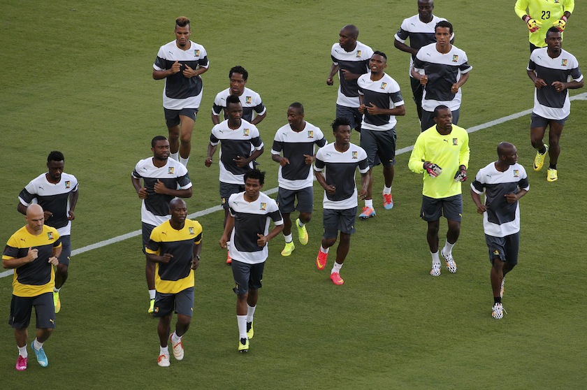 Cameroon national team players run during a training session at the Dunas Arena stadium in Natal, June 12, 2014. Cameroon will play Mexico at midnight. u00e2u20acu201d Reuters pic
