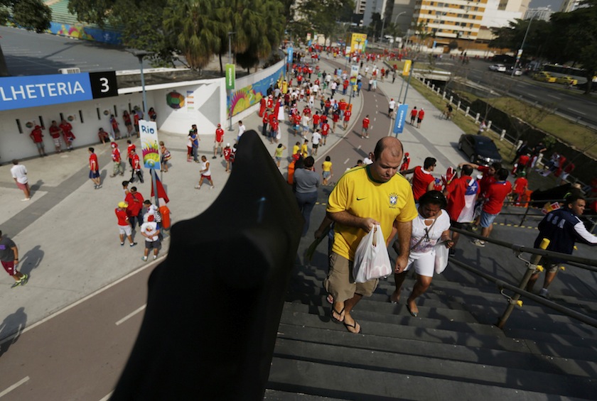 Football fans use a temporary staircase as one of the main entry points for thousands of fans to reach Maracana stadium before watching Chile play Spain in the 2014 World Cup, in Rio de Janeiro June 19, 2014. u00e2u20acu201du00c2u00a0Reuters pic