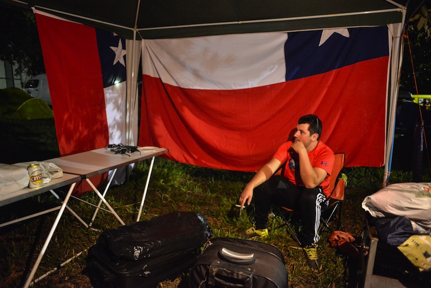 A Chile fan who drove overland from his country camps out after they arrived to watch their national team play its first 2014 World Cup match in Cuiaba, June 12, 2014. u00e2u20acu201d Reuters pic