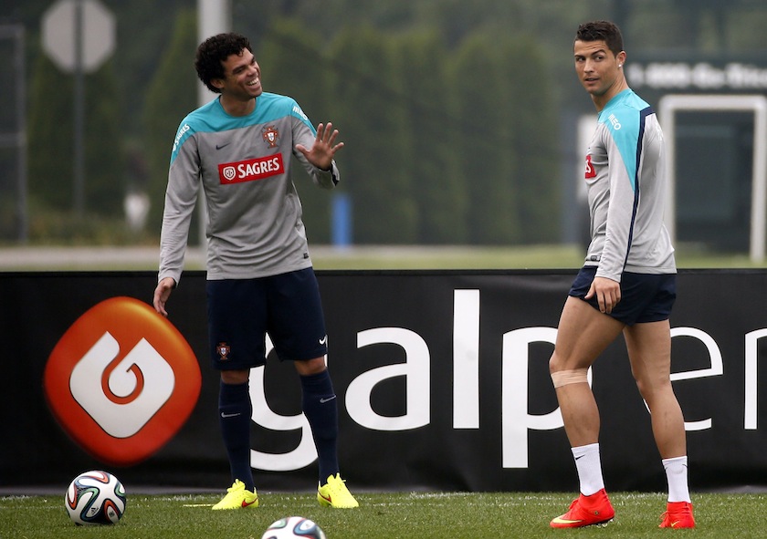 Portugal's Cristiano Ronaldo (right) and Pepe joke during a team practice session in Florham Park, New Jersey, June 9, 2014. u00e2u20acu201d Reuters pic