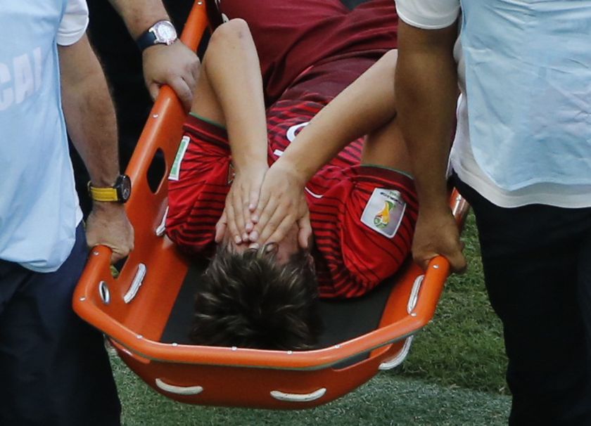 Portugal's Fabio Coentrao is carried off during the 2014 World Cup Group G football match between Germany and Portugal at the Fonte Nova arena in Salvador June 16, 2014. u00e2u20acu201d Reuters pic