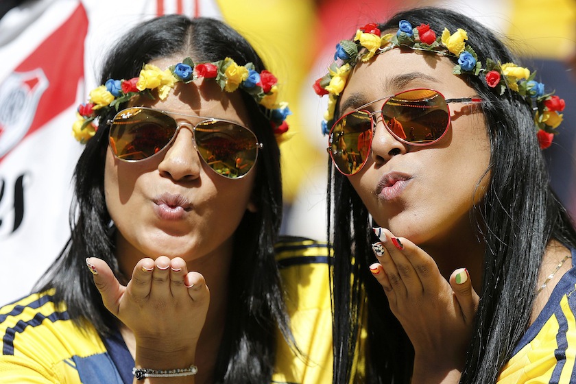 Supporters of Colombia's national team blow kisses before their 2014 World Cup Group C  match against the Ivory Coast at the Mane Garrincha National Stadium in Brasilia, June 20, 2014.u00c2u00a0u00e2u20acu201d Reuters pic