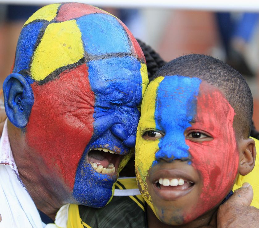 Colombia fans wearing face paint react as they watch a broadcast of the 2014 World Cup round of 16 game between Colombia and Uruguay, in Cali June 28, 2014. u00e2u20acu201d Reuters pic