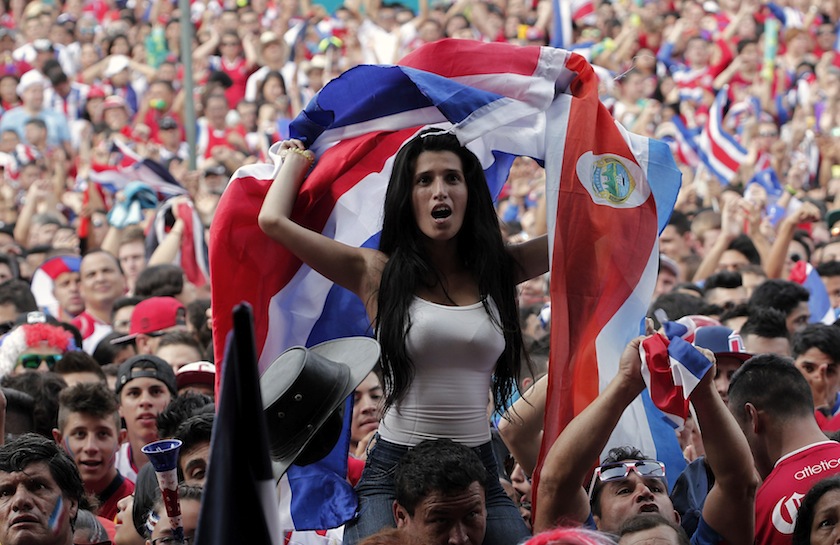 Costa Rica's fans celebrate after their team scored a goal against Greece as they watch a broadcast of their 2014 World Cup round of 16 game in San Jose June 30, 2014. u00e2u20acu201d Reuters pic
