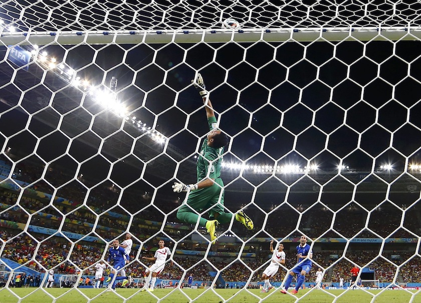 Costa Rica's goalkeeper Keilor Navas jumps to deflect a goal attempt by Greece during their 2014 World Cup round of 16 game at the Pernambuco arena in Recife June 30, 2014.u00c2u00a0u00e2u20acu201d Reuters pic