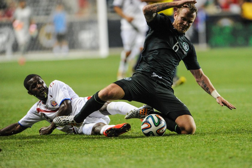 Costa Rica forward Joel Campbell (9) tackles Ireland midfielder Glenn Whelan (6) during the second half of their friendly match June 6, 2014, at PPL Park Chester, PA, USA. u00e2u20acu201dJohn Geliebter-USA TODAY/Reuters pic