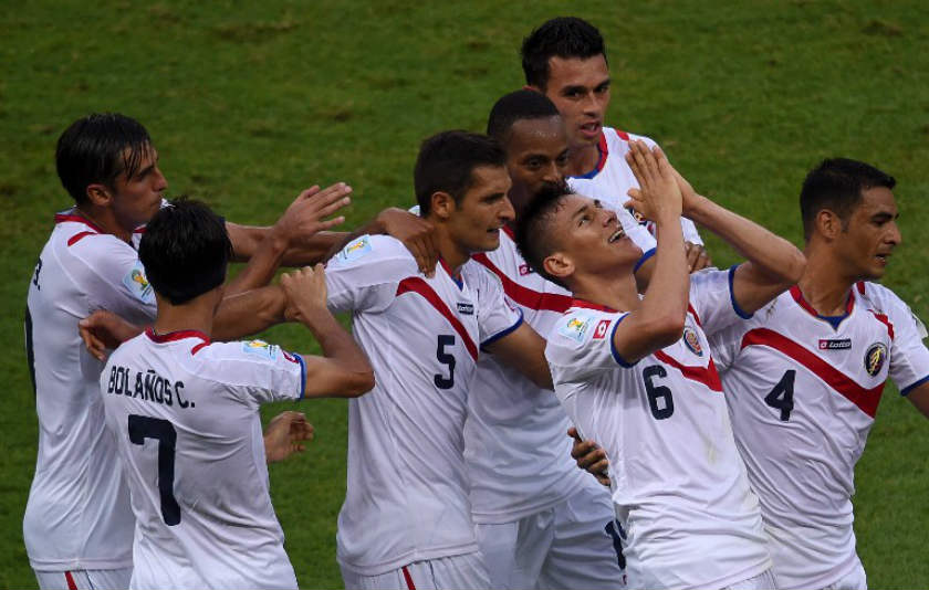 Costa Rica's defender Oscar Duarte (second right) celebrates with team-mates after scoring their second goal during a Group D football match between Uruguay and Costa Rica. u00e2u20acu201d AFP pic