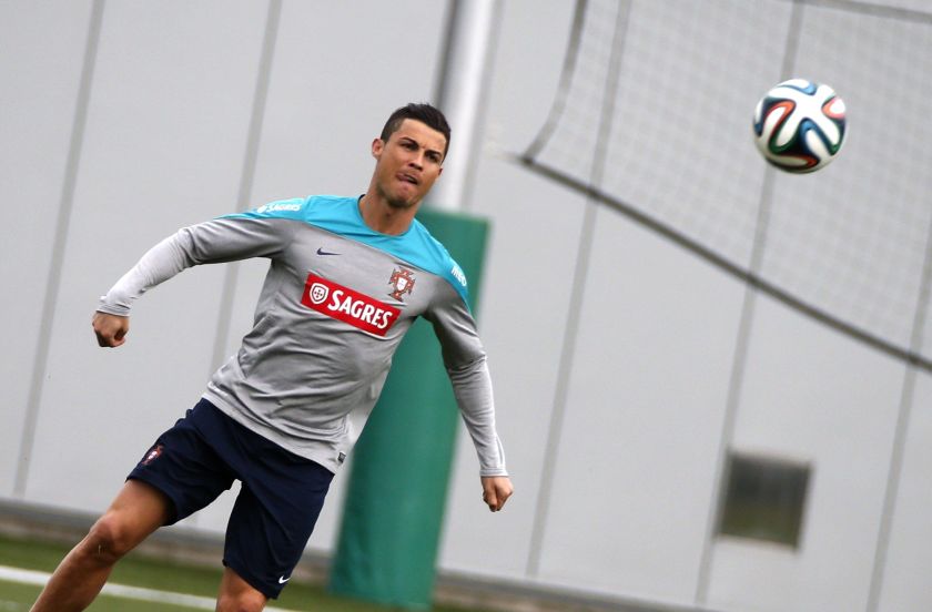 Portugal's Cristiano Ronaldo warms up during a training session for their upcoming international friendly matches in Florham Park, New Jersey, June 4, 2014. u00e2u20acu2022 Reuters pic